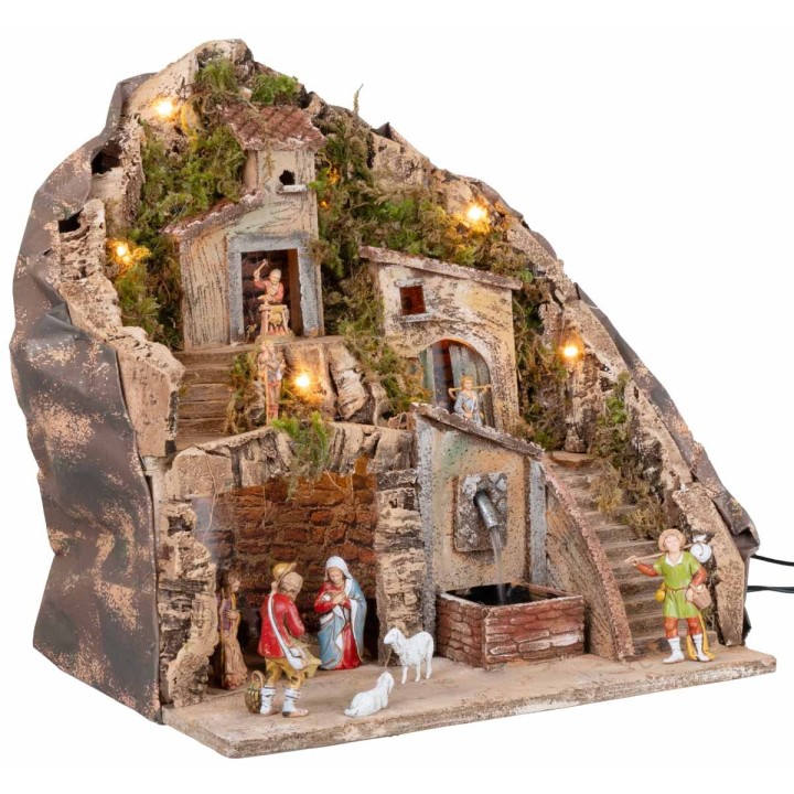 Presepe illuminato con fontana 34x27x38h completo di statue