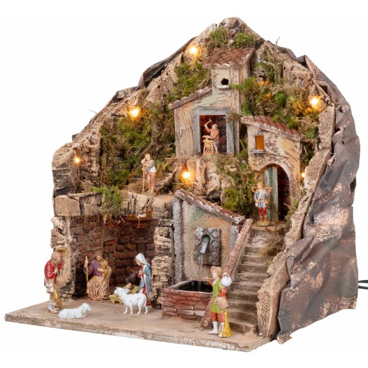 Belén iluminado con fuente 34x27x38h completo de estatuas