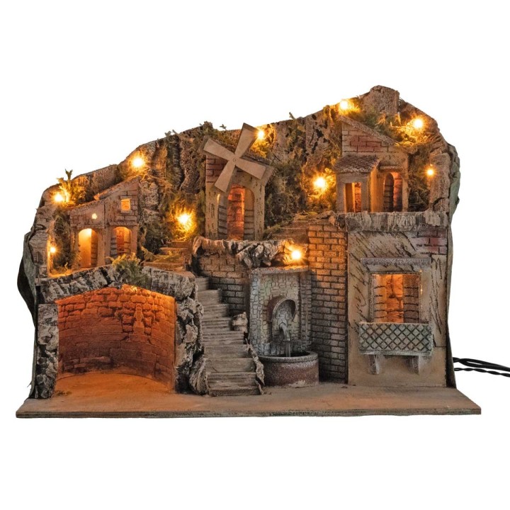 Illuminated nativity scene with electric-powered mill and fountain