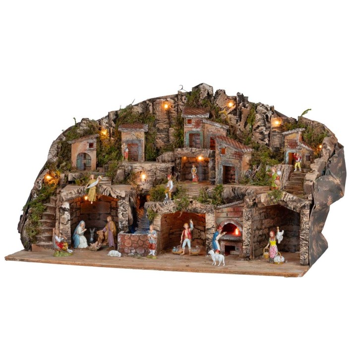 Presepe illuminato con grotte, casette, ruscello e forno