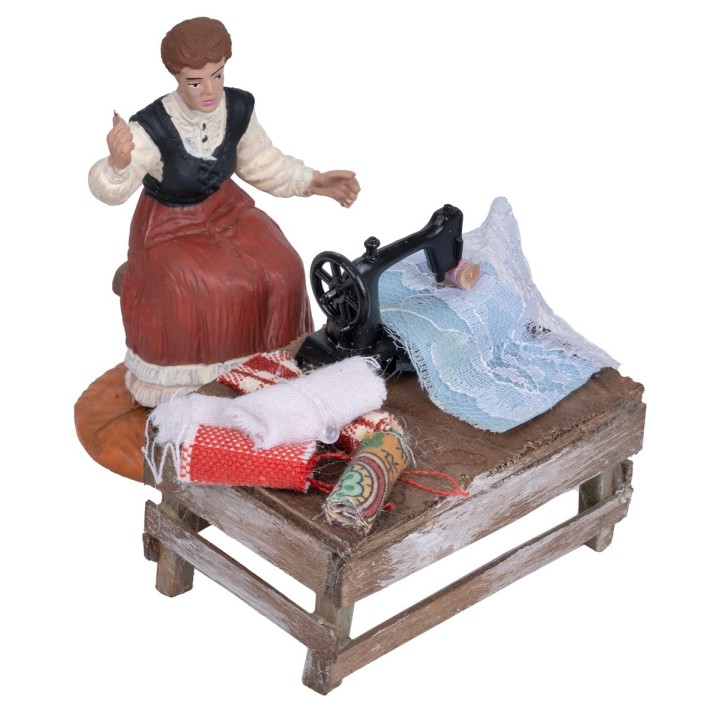 Seamstress table with machine and fabrics