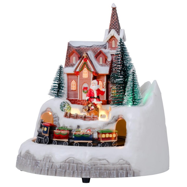 Village with moving train complete with lights and music