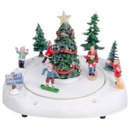 Pista di pattinaggio con albero di natale completa di luce e