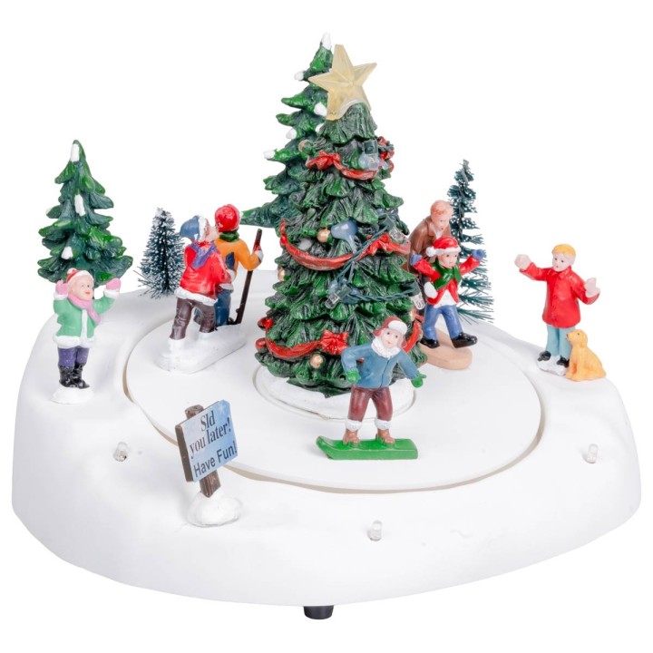 Pista di pattinaggio con albero di natale completa di luce e
