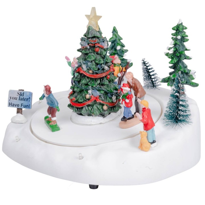 Pista di pattinaggio con albero di natale completa di luce e