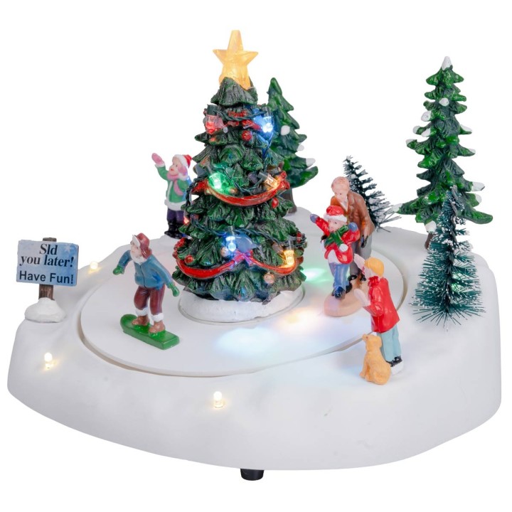 Pista di pattinaggio con albero di natale completa di luce e