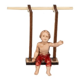 Bambino su altalena in legno serie 10 cm