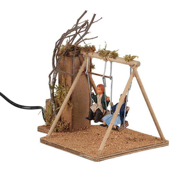 Bimbi sull'altalena serie 15 cm in movimento