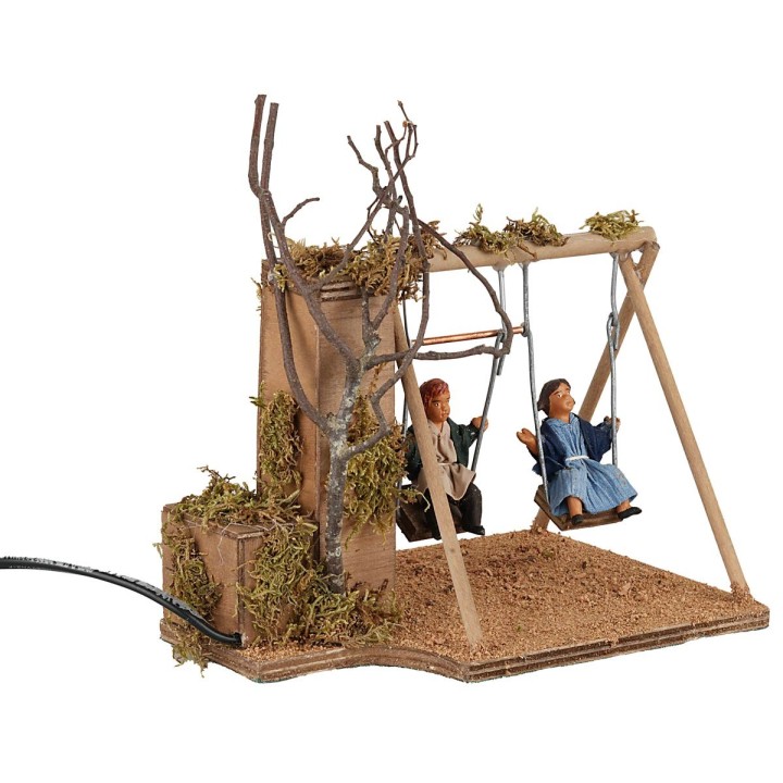 Bimbi sull'altalena serie 15 cm in movimento
