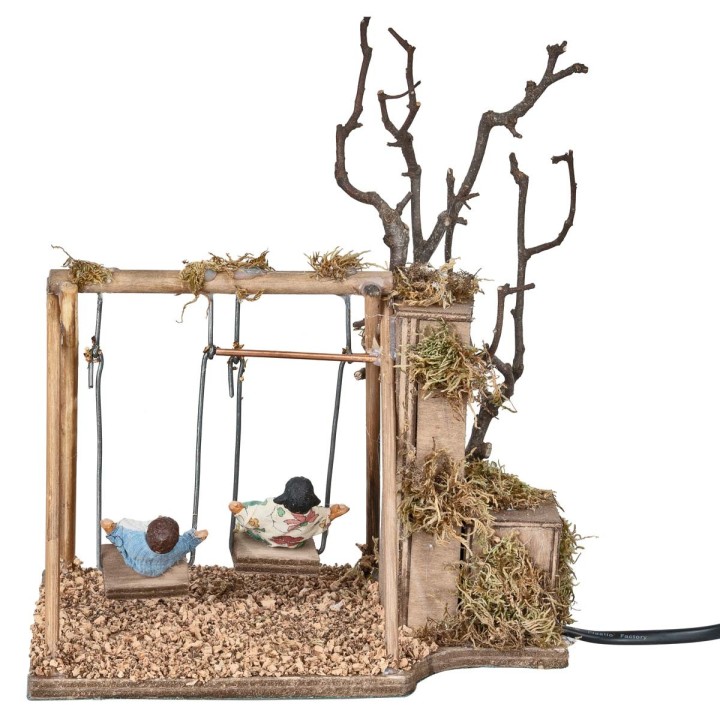 Coppia di bambini su altalena serie 12 cm in movimento