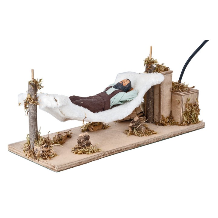 Uomo che dorme su amaca serie 12 cm in movimento