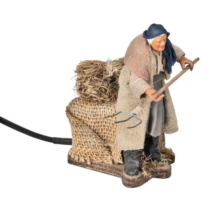 Agricultor con rastrillo serie 12 cm en movimiento