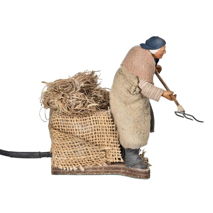 Agricultor con rastrillo serie 12 cm en movimiento