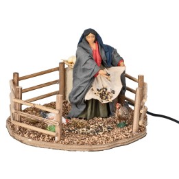Contadina che ciba le galline in movimento 12 cm
