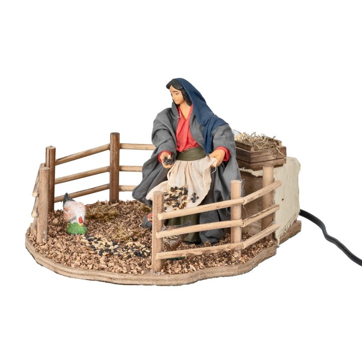 Farmer woman feeding chickens in motion 12 cm