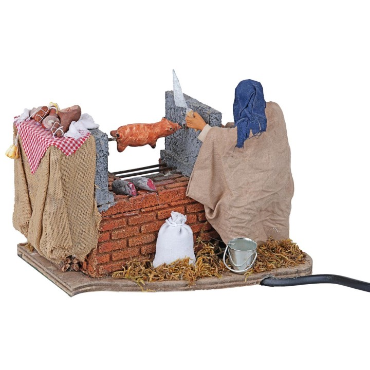 Man turning the porchetta in motion with oven 12 cm
