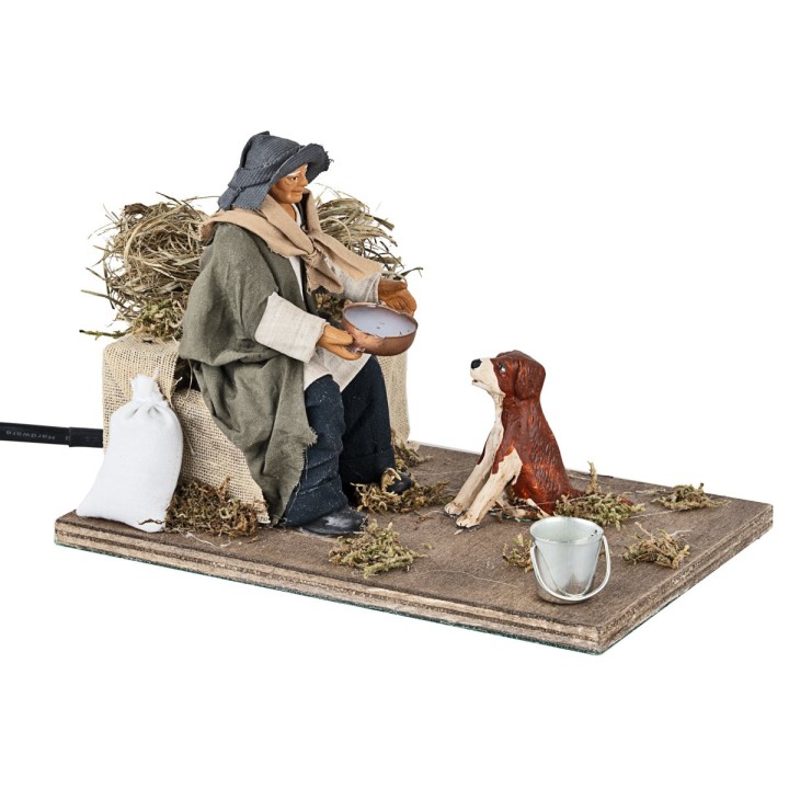 Man giving water to the dog in movement 12 cm