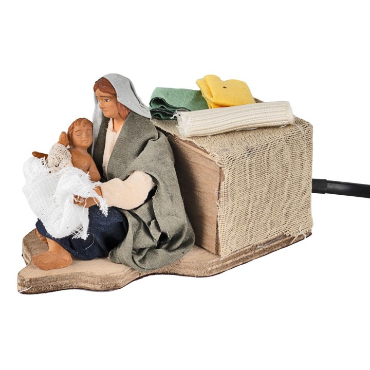 Mother caressing child in motion 12 cm
