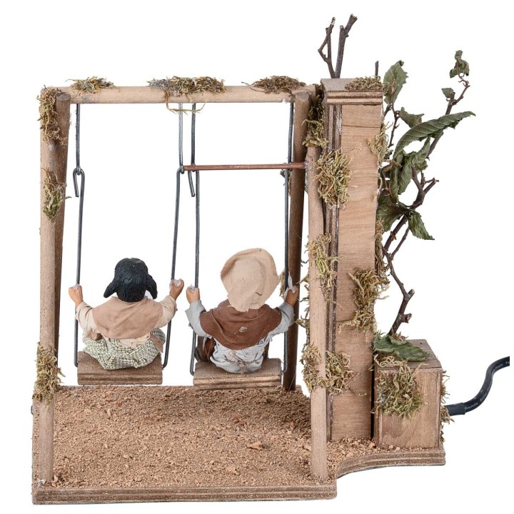 Children on a moving swing 24 cm