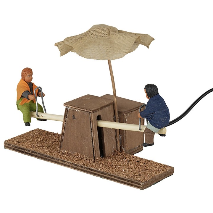 Bimbi sul dondolino in movimento 12 cm