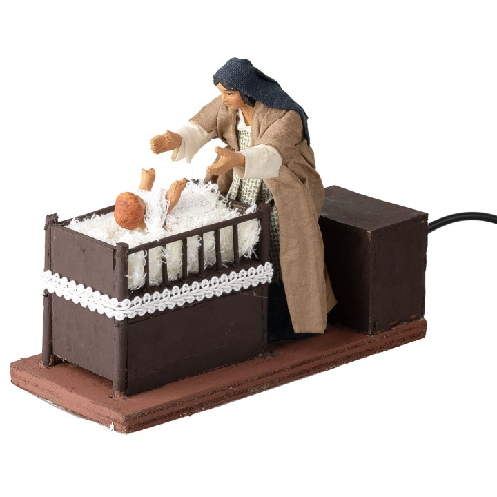 Mother taking baby from the cradle 12 cm in motion