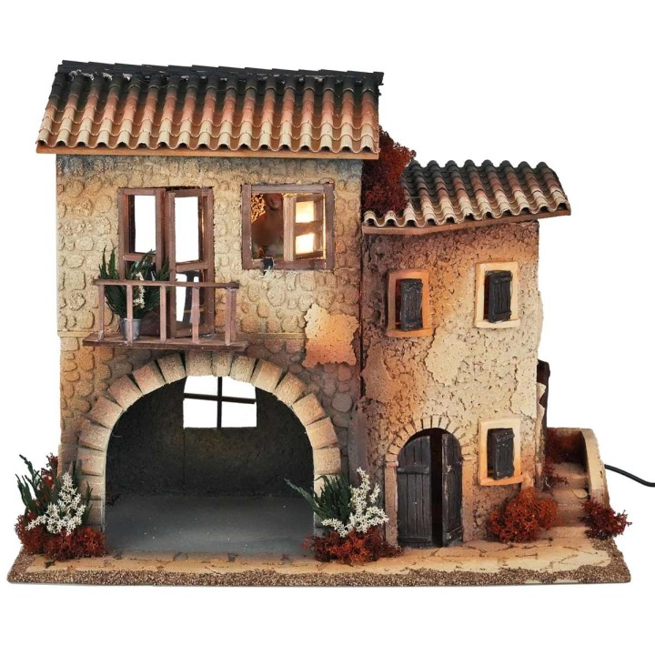 Borgo illuminato con donna in movimento cm 50x30x41.5 h