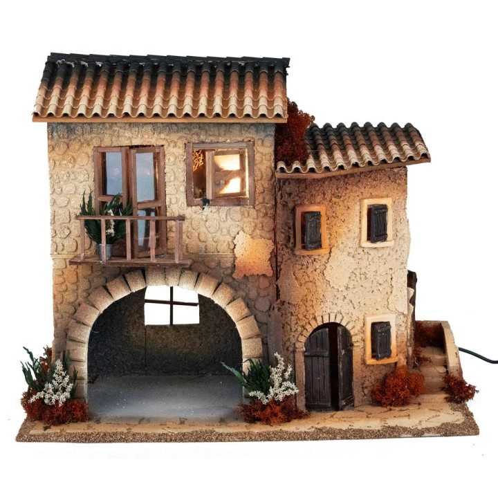 Borgo illuminato con donna in movimento cm 50x30x41.5 h