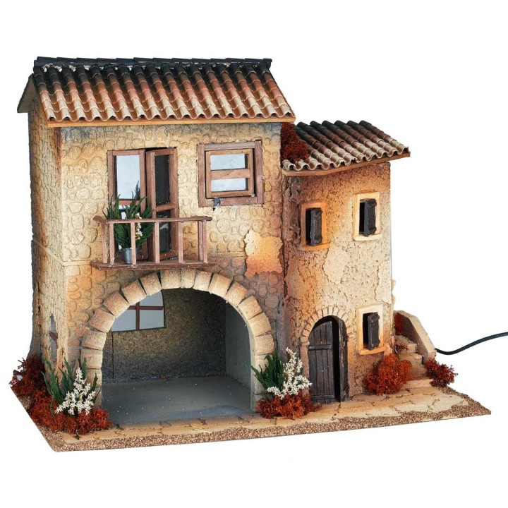 Borgo illuminato con donna in movimento cm 50x30x41.5 h