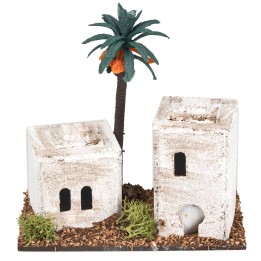 Casa árabe con torre y palma cm 12x7x12 h.