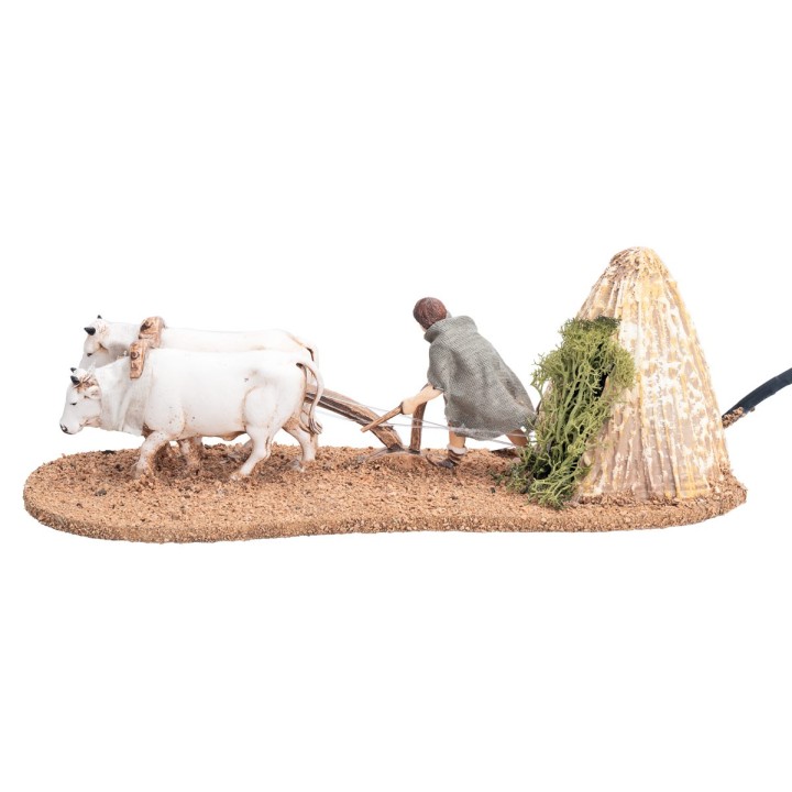 Contadino con buoi e aratro in movimento 10 cm