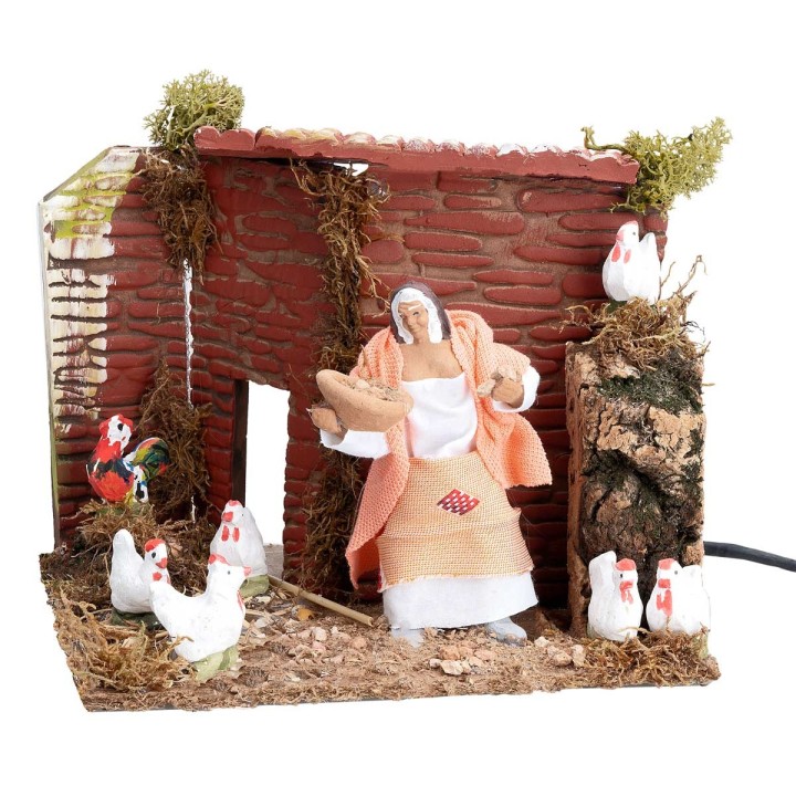 Campesina con gallinas 10 cm en movimiento cm 17x14x14 h