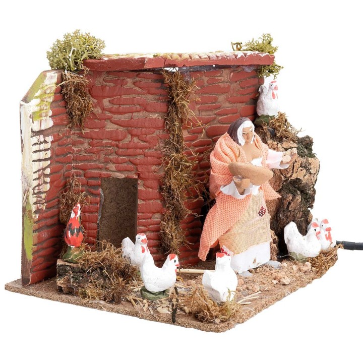 Campesina con gallinas 10 cm en movimiento cm 17x14x14 h
