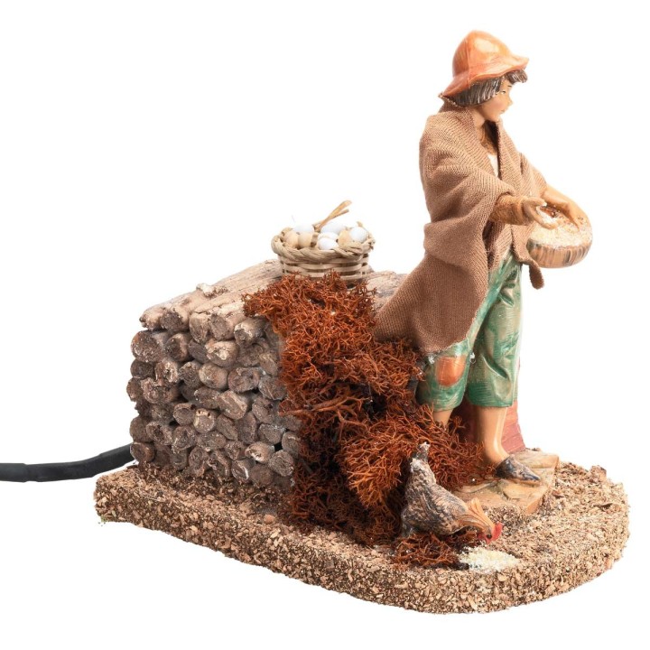 Campesina con gallina serie Fontanini 12 cm en movimiento
