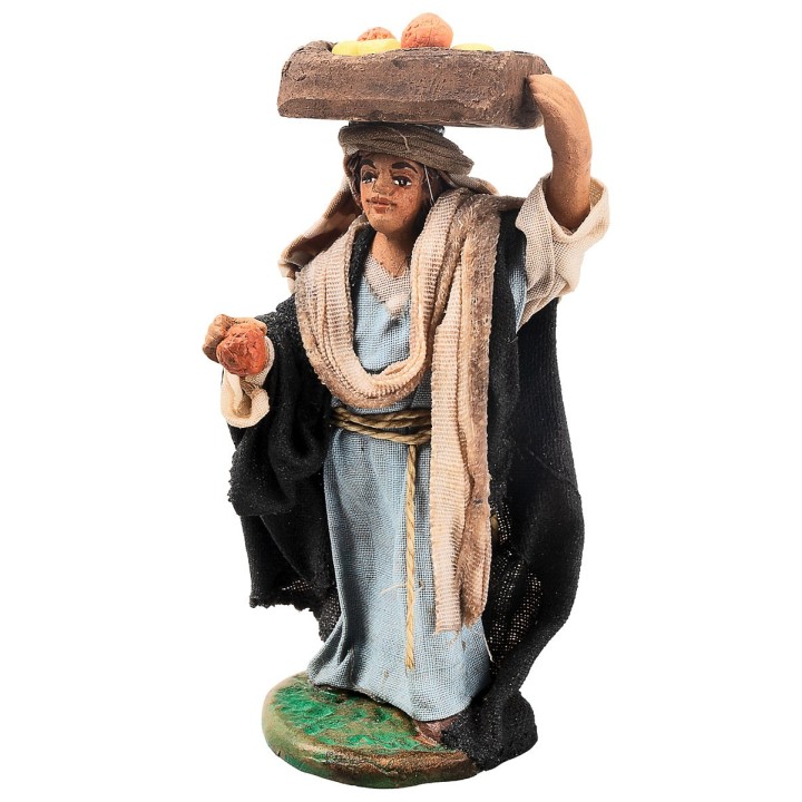 Woman with a crate of fruit 10 cm in terracotta with fabric