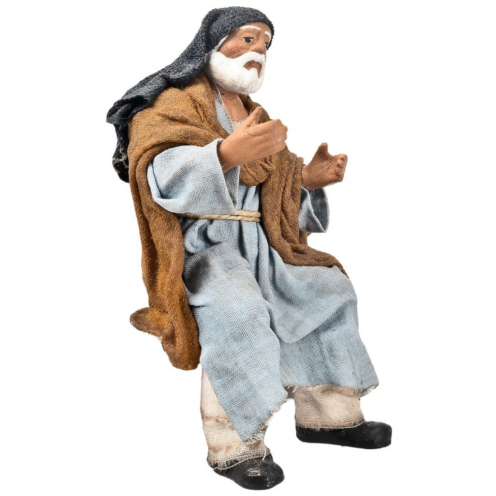 Seated Palestinian man 15 cm series in terracotta with fabric