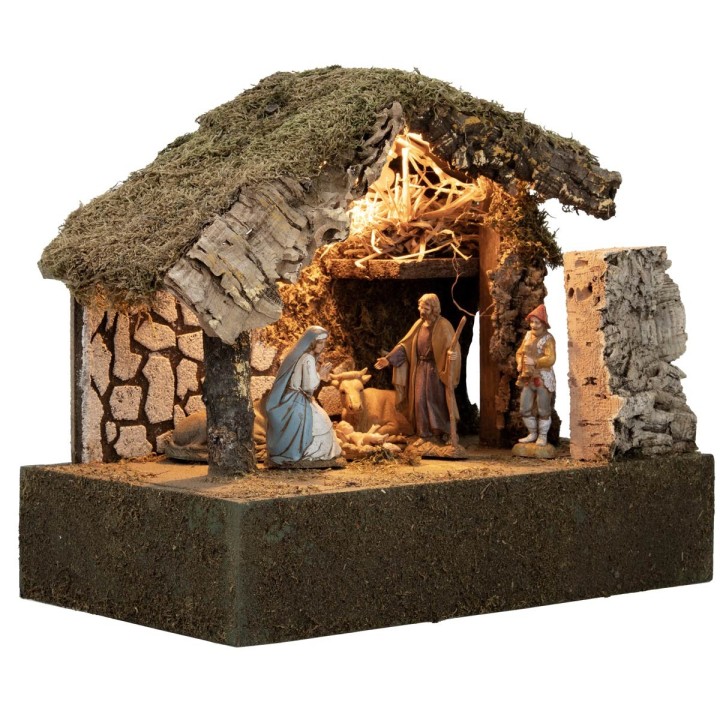 Illuminated hut with Nativity and moving bagpiper cm