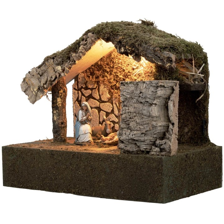Illuminated hut with Nativity and moving bagpiper cm