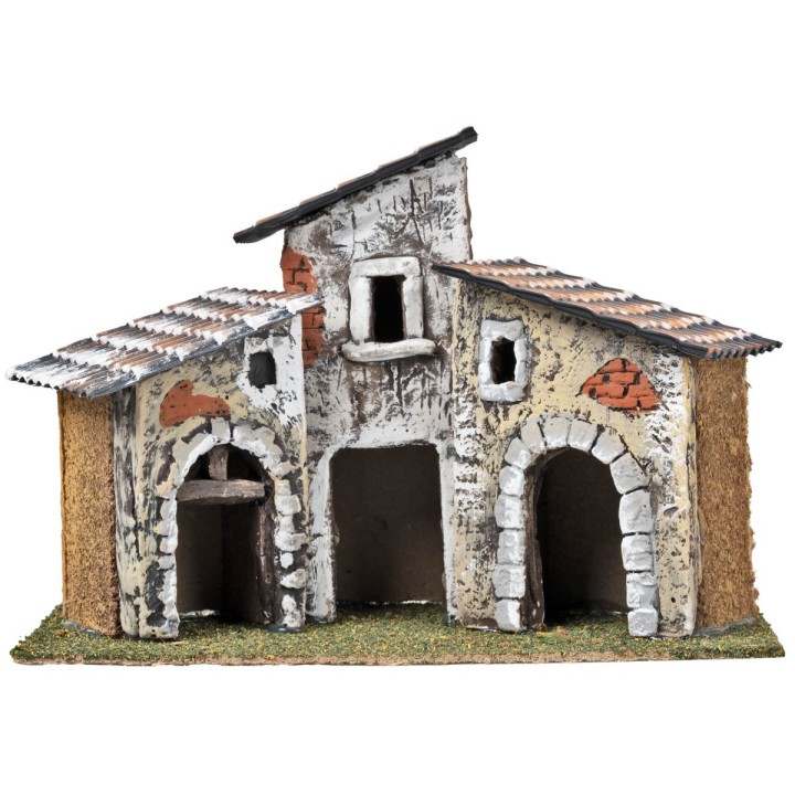 Tre case con archi in pietra e facciate invecchiate cm