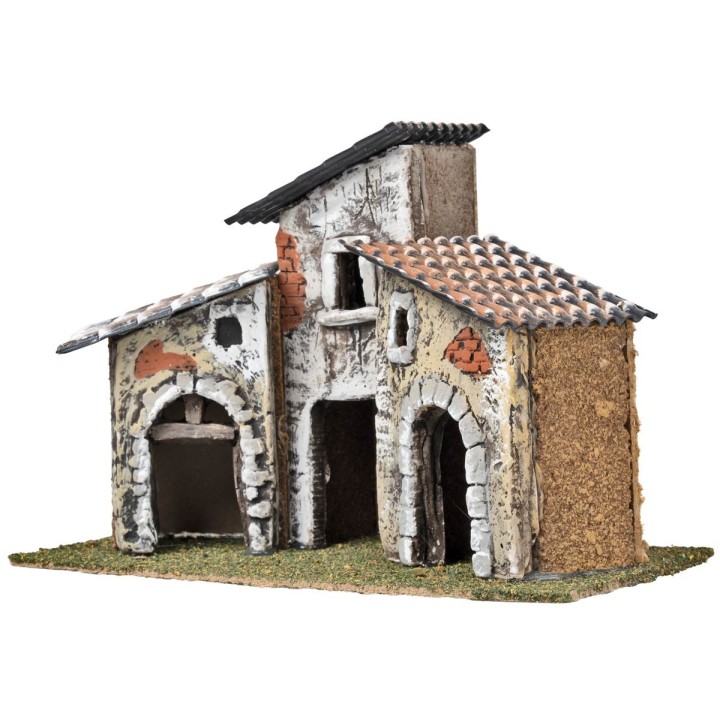 Tre case con archi in pietra e facciate invecchiate cm