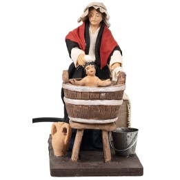 Woman washing child in motion 14 cm