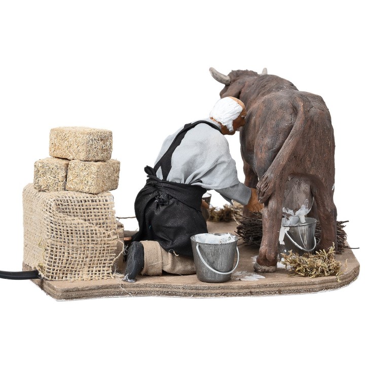 Farmer milking in motion series 14 cm