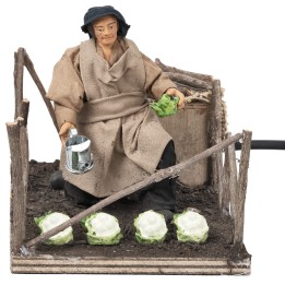 Campesina que cultiva hortalizas en movimiento serie 10 cm
