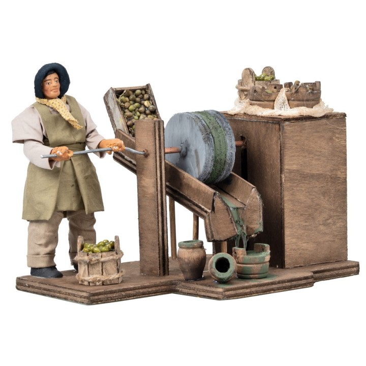 Man grinding olives in motion series 12 cm