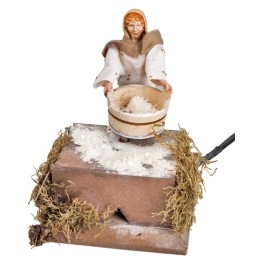 Woman with sieve and flour in motion 12 cm