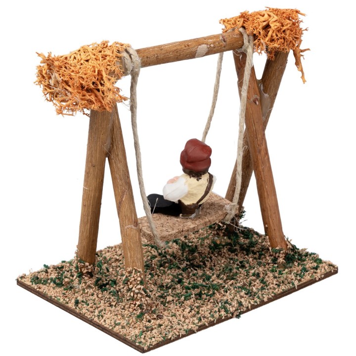 Child on the swing h 10 cm