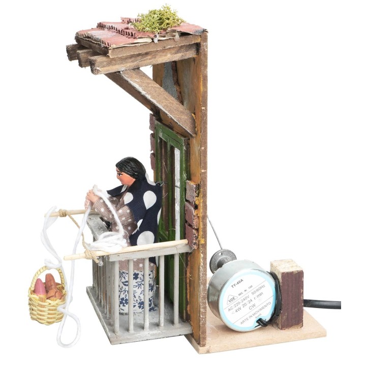 Woman on the balcony with basket 10 cm in motion