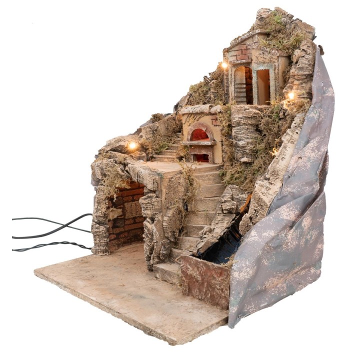 Presepe illuminato con forno e ruscello funzionante a corrente