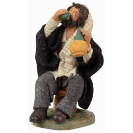 Uomo seduto che beve serie 12 cm