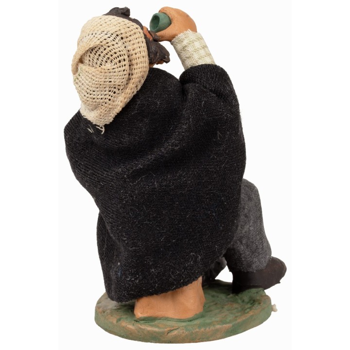 Seated man drinking 12 cm series