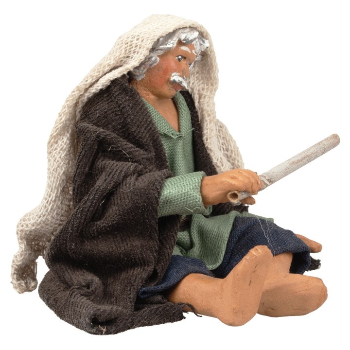 Seated man stoking the fire series 12 cm